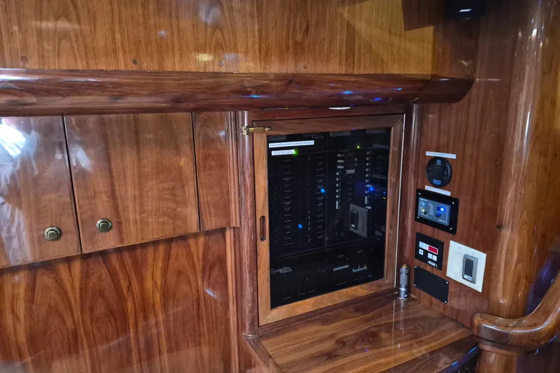 Slide: The Image of Control panel of 2003 Navigator Californian Veneti yacht with polished wood finish. - 39