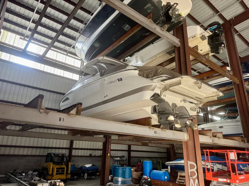 Slide: The Image of 2018 Cobalt R35 boat stored in a warehouse. - 1