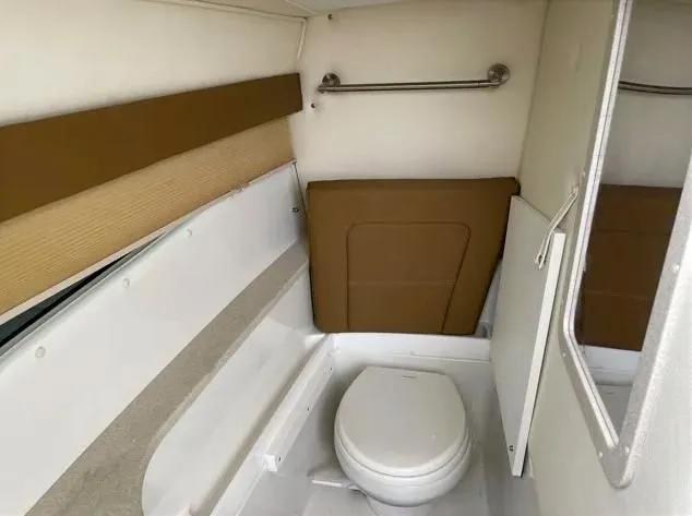 Slide: The Image of Interior of a 2018 Cobalt R35 with toilet and mirror. - 10