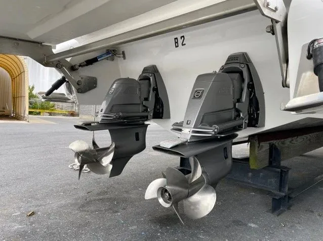 Slide: The Image of Dual outboard motors of a 2018 Cobalt R35 boat. - 13