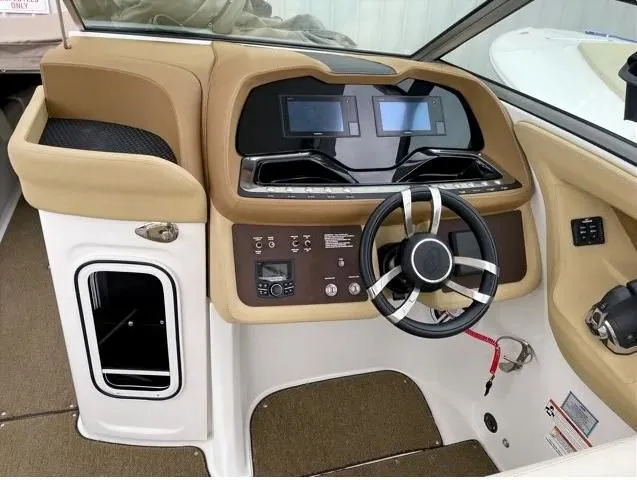 Slide: The Image of Interior of a 2018 Cobalt R35 boat with modern dashboard. - 4