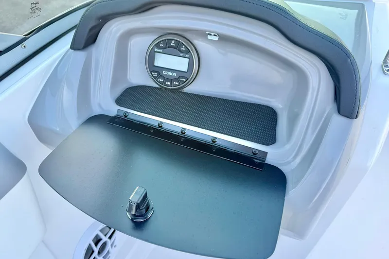 Slide: The Image of 2024 Chaparral 19 SSi OB boat dashboard with Clarion audio system. - 20