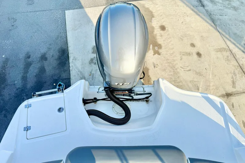 Slide: The Image of 2024 Chaparral 19 SSi OB boat with outboard motor, viewed from above. - 56