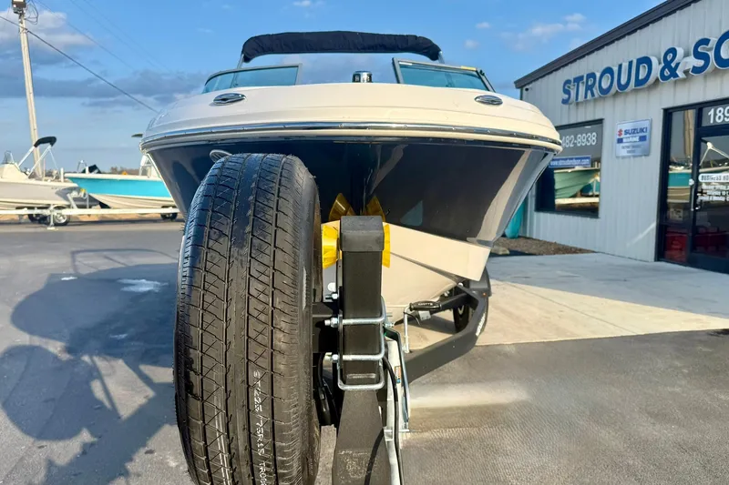 Slide: The Image of 2024 Chaparral 19 SSi OB boat on trailer at dealership. - 9