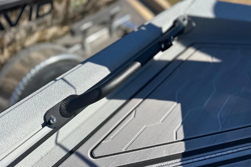 Slide: The Image of Close-up of Avid 18 Commander 2026 boat handle and textured surface. - 19