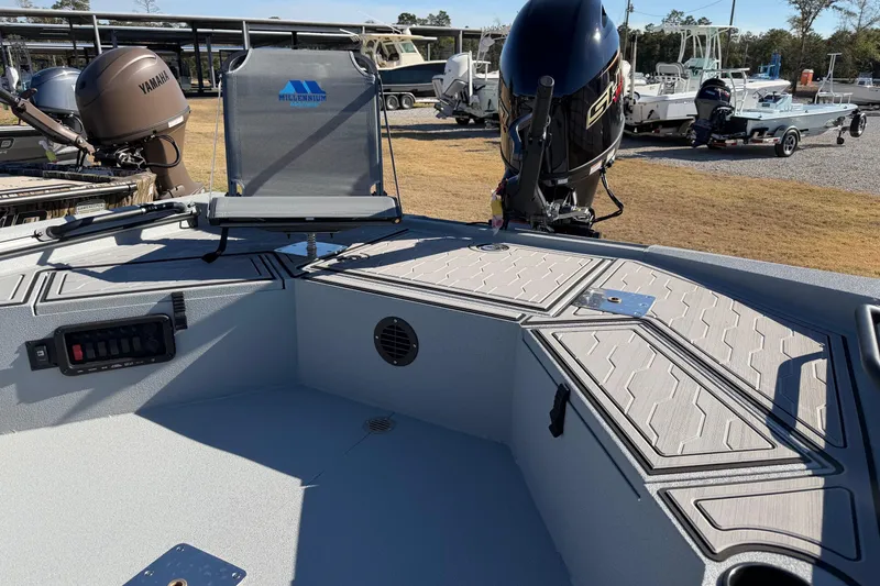 Slide: The Image of 2026 Avid 18 Commander boat interior with Yamaha motor and Millennium seat. - 7