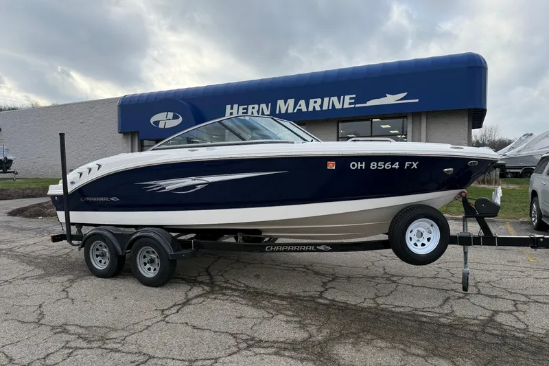 The Image of 2020 Chaparral 21 SSi Ski & Fish boat on trailer at Hern Marine dealership. - 0