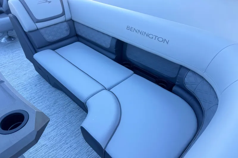 Slide: The Image of 2026 Bennington 23 SSR boat interior with luxurious seating and cup holders. - 10