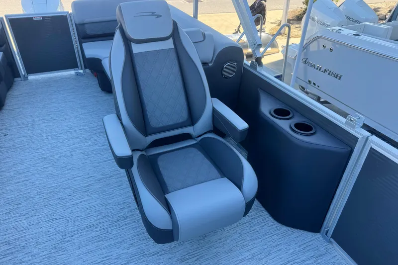 Slide: The Image of 2026 Bennington 23 SSR boat interior with luxurious seating and cup holders. - 13
