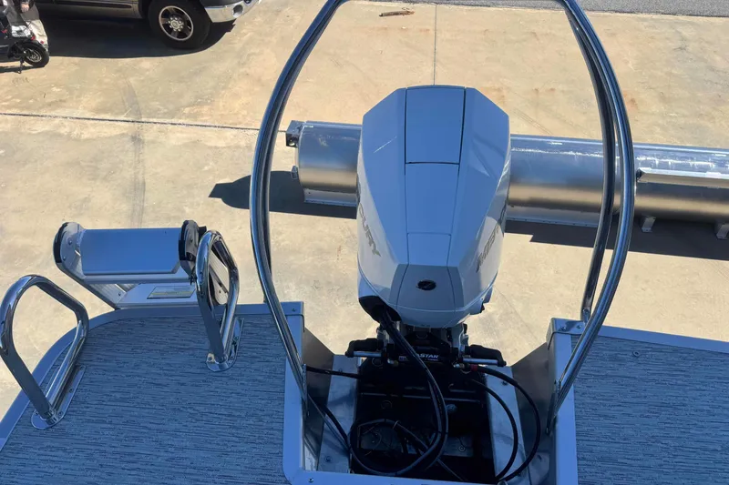 Slide: The Image of 2026 Bennington 23 SSR boat with outboard motor and rear deck view. - 16