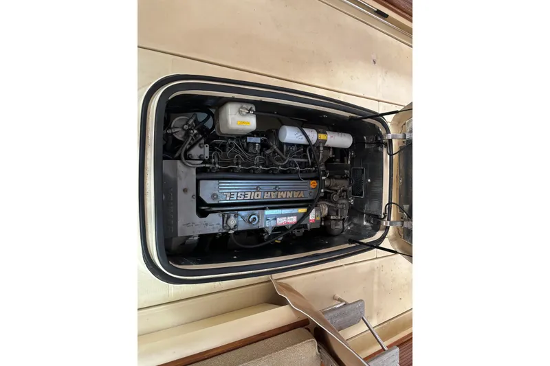 Slide: The Image of Engine compartment of a 2005 C.W. Hood Katama 30 boat, featuring a Yanmar diesel engine. - 23