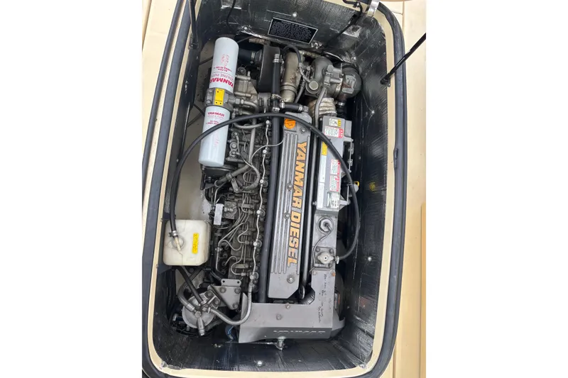 Slide: The Image of Engine compartment of a 2005 C.W. Hood Katama 30 with Yanmar diesel engine. - 26