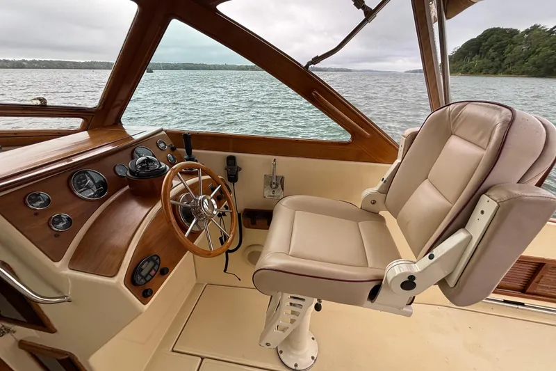 Slide: The Image of Helm of 2005 C.W. Hood Katama 30 boat with leather seat and wooden steering wheel. - 3