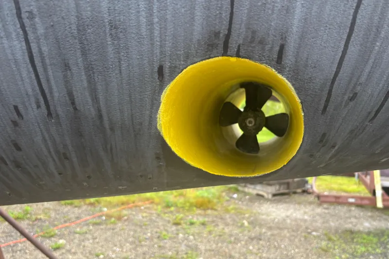 Slide: The Image of Bow thruster of 2017 Jeanneau Sun Odyssey 389 sailboat, close-up view. - 12