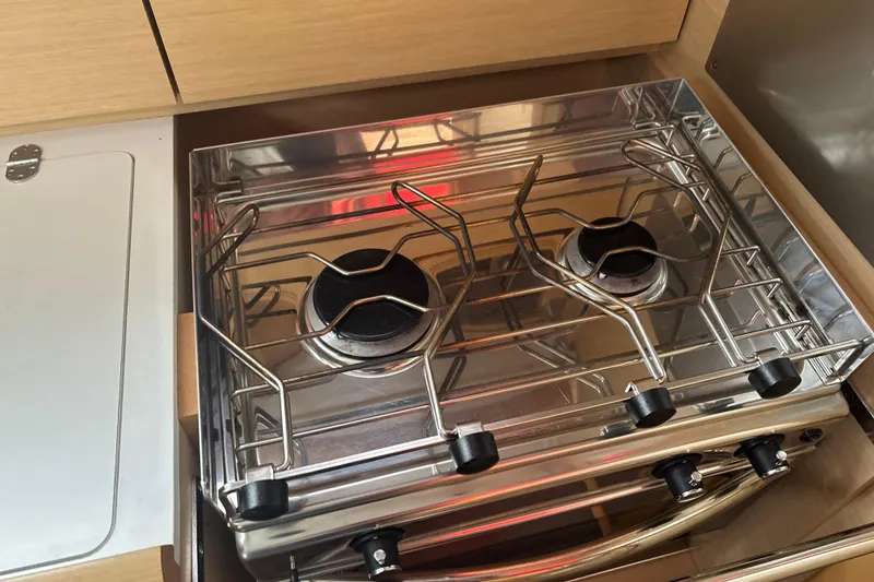 Slide: The Image of Stainless steel stove in 2017 Jeanneau Sun Odyssey 389 yacht kitchen. - 43