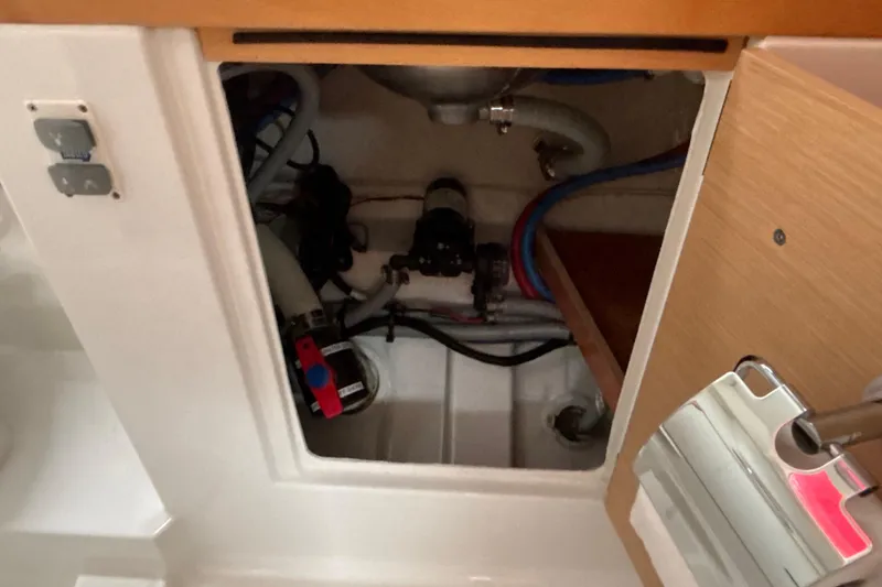 Slide: The Image of Interior view of 2017 Jeanneau Sun Odyssey 389 yacht's engine compartment. - 55