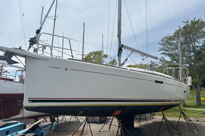 Slide: The Image of 2017 Jeanneau Sun Odyssey 389 sailboat on stands, ready for maintenance. - 7