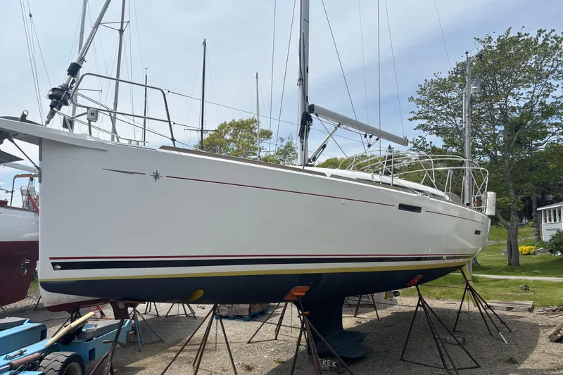Slide: The Image of 2017 Jeanneau Sun Odyssey 389 sailboat on land, ready for maintenance. - 8