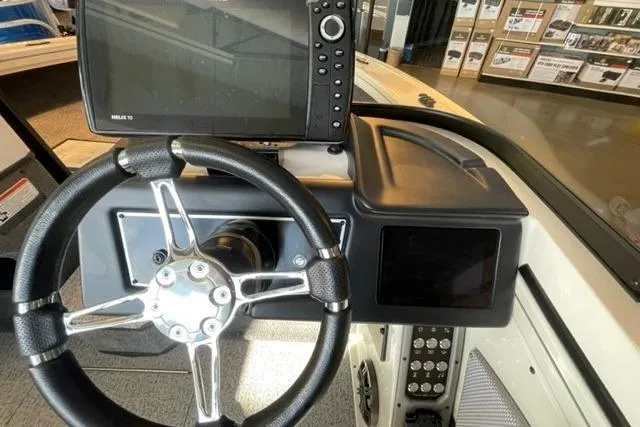 Slide: The Image of Steering console of 2024 Ranger VX1988 WT boat with modern navigation system. - 11