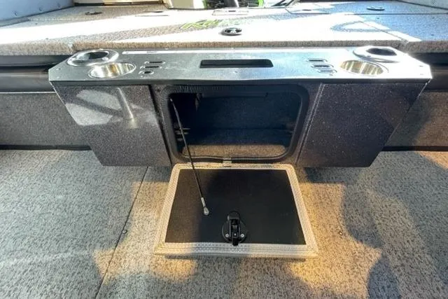 Slide: The Image of 2024 Ranger VX1988 WT boat interior with storage compartment and cup holders. - 112