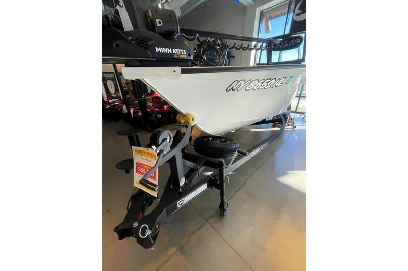 Slide: The Image of 2024 Ranger VX1988 WT boat on trailer with Minn Kota motor in showroom. - 113