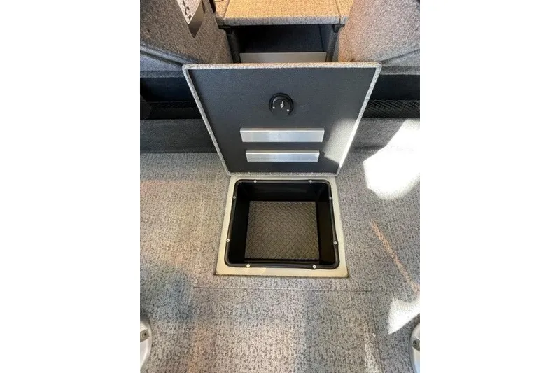 Slide: The Image of 2024 Ranger VX1988 WT boat storage compartment with open hatch, showcasing interior space. - 117