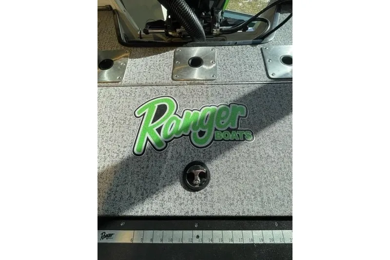 Slide: The Image of 2024 Ranger VX1988 WT boat deck with logo and measurement scale. - 124