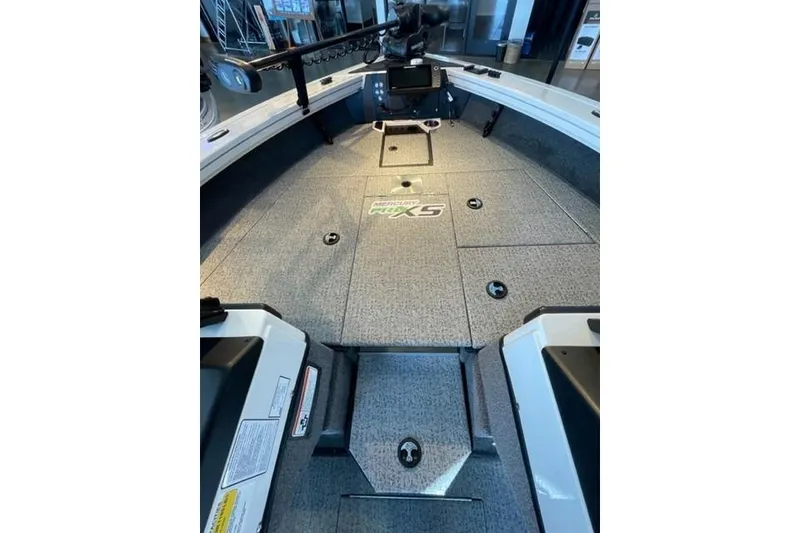 Slide: The Image of 2024 Ranger VX1988 WT boat interior with advanced control panel and spacious deck. - 127