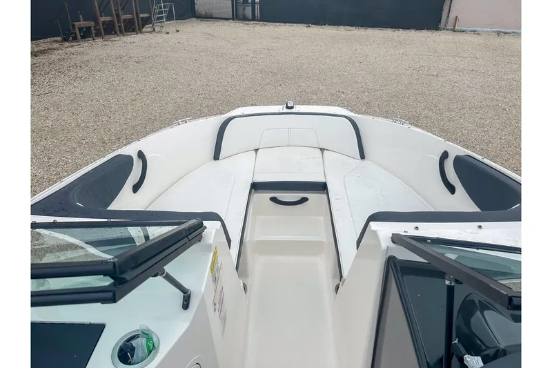 Slide: The Image of 2016 Searay 190 SPX boat interior with white seating and open windshield. - 6