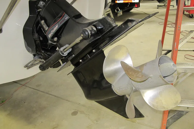 Slide: The Image of 2003 Chaparral 280 SSi boat with MerCruiser Bravo Three outdrive and dual propellers. - 15