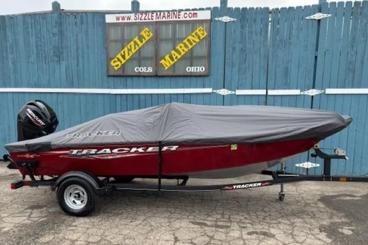 Slide: The Image of 2021 Tracker Super Guide V-16 SC boat with cover on trailer at Sizzle Marine. - 21
