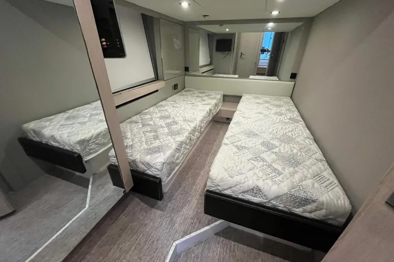 Slide: The Image of Interior of 2012 Fairline Targa 58 Gran Turismo with twin beds and modern design. - 13