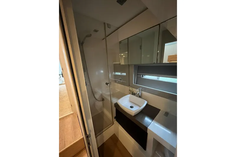 Slide: The Image of Bathroom interior of 2012 Fairline Targa 58 Gran Turismo yacht, featuring modern sink and shower. - 15
