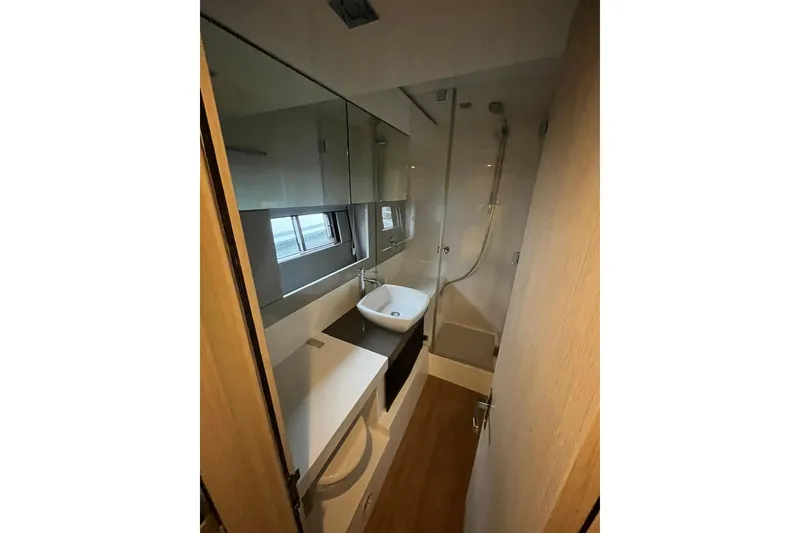 Slide: The Image of Luxurious bathroom in 2012 Fairline Targa 58 Gran Turismo yacht, featuring modern fixtures and sleek design. - 17