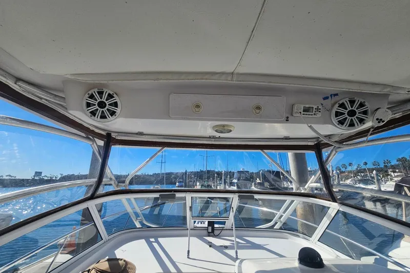 Slide: The Image of Interior view of 2006 Pro-Line 32 Express boat with clear windows and speakers. - 6