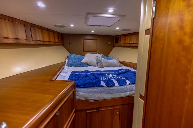 Slide: The Image of Luxurious cabin interior of 2000 Custom Carolina Alex Willis Convertible yacht. - 11