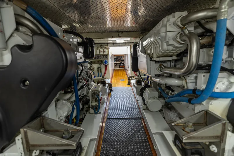 Slide: The Image of Engine room of 2000 Custom Carolina Alex Willis Convertible, showcasing machinery and components. - 27