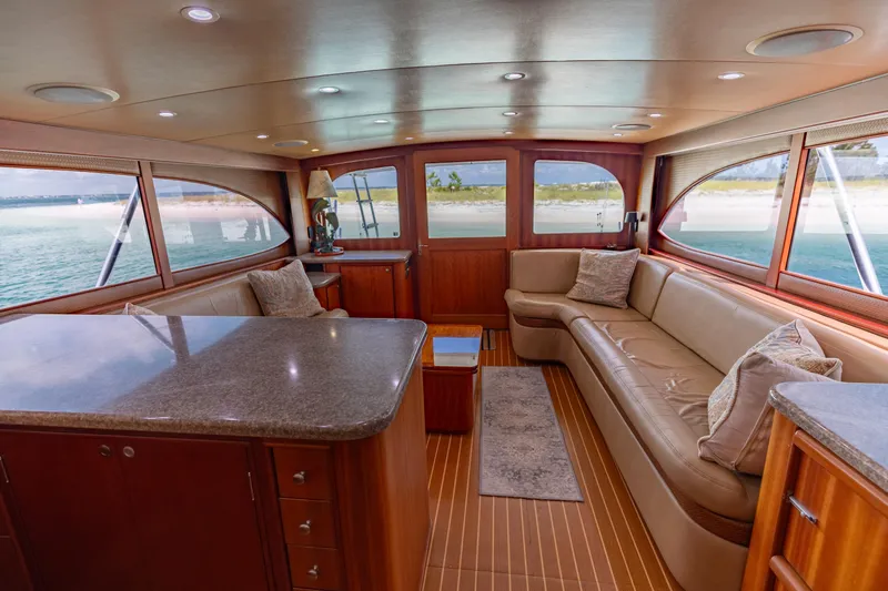Slide: The Image of Luxurious interior of 2000 Custom Carolina Alex Willis Convertible yacht with elegant seating and ocean view. - 4