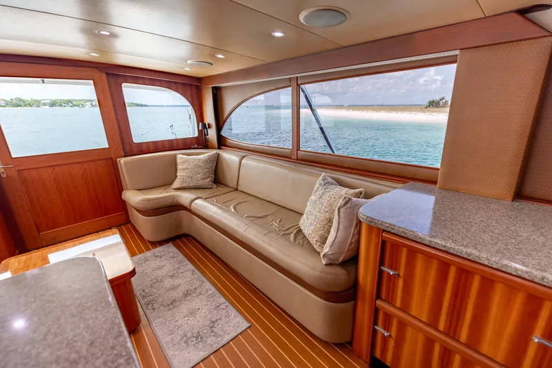 Slide: The Image of Luxurious interior of 2000 Custom Carolina Alex Willis Convertible yacht with ocean view. - 7