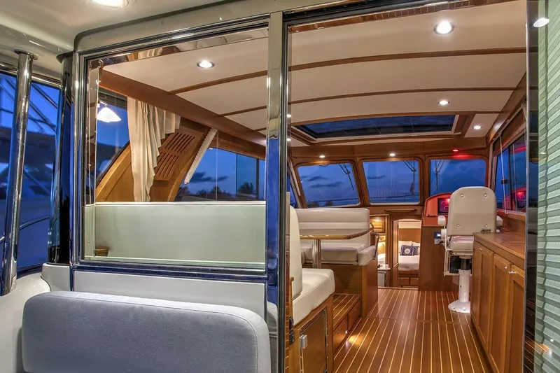 Slide: The Image of Luxurious interior of 2027 Sabre 38 Salon Express yacht with elegant wood finishes. - 12