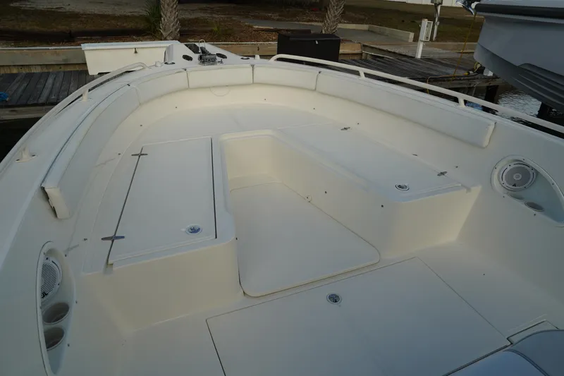 Slide: The Image of 2013 Stamas 317 Tarpon boat interior with spacious seating and storage compartments. - 31