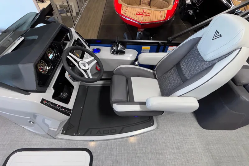 Slide: The Image of Captain's seat and helm of 2026 Viaggio Z24U boat, featuring modern controls and design. - 26