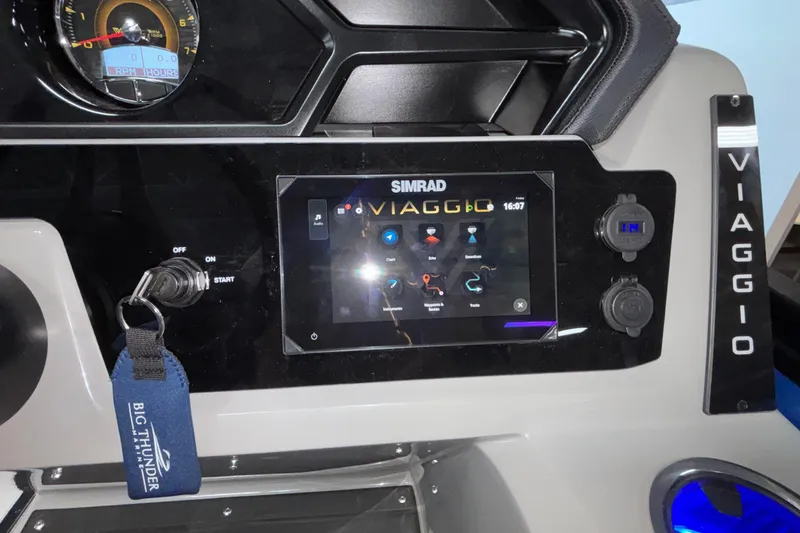 Slide: The Image of Viaggio Z24U 2026 dashboard with Simrad display and ignition key. - 31