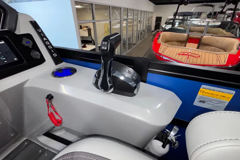 Slide: The Image of Control panel of 2026 Viaggio Z24U boat with throttle and seating area. - 32