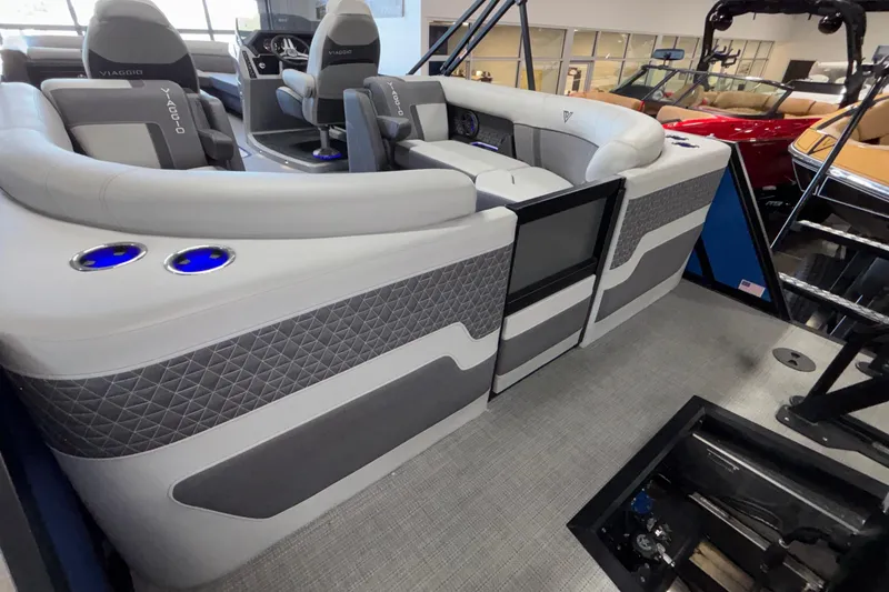 Slide: The Image of Luxurious interior of 2026 Viaggio Z24U boat with modern seating and blue LED cup holders. - 37