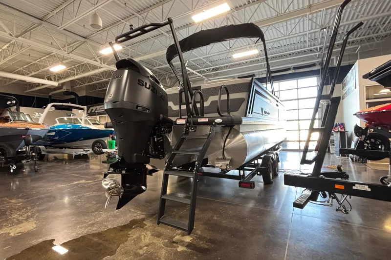 Slide: The Image of 2026 Viaggio Z24U pontoon boat with Suzuki outboard motor in showroom. - 45