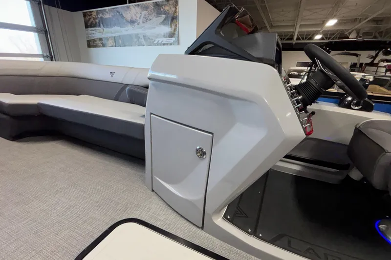 Slide: The Image of Interior of 2026 Viaggio Z24U boat with modern helm and seating. - 11