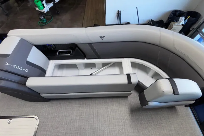 Slide: The Image of Viaggio Z24U 2026 boat interior with gray seating and storage compartment. - 13