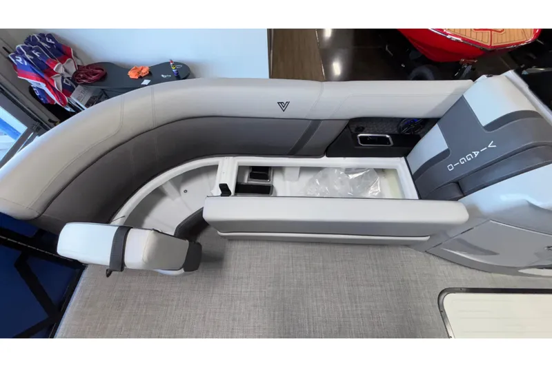 Slide: The Image of 2026 Viaggio Z24U boat interior with gray seating and storage compartment. - 15