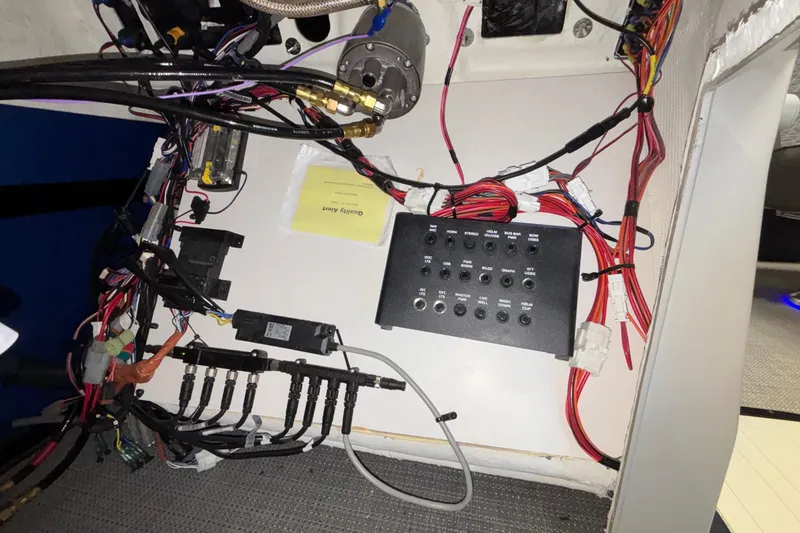 Slide: The Image of Electrical panel and wiring inside a Viaggio Z24U, 2026 model. - 20